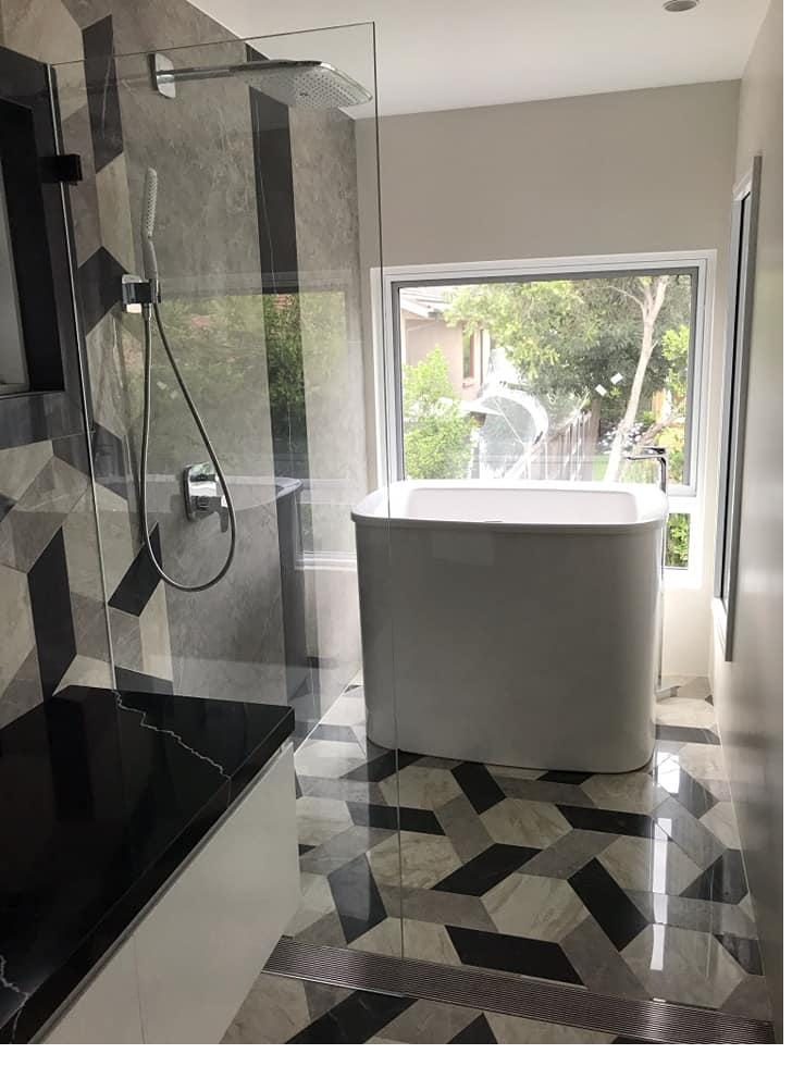 AQVA Pastille 1140 freestanding bath installed in a residential bathroom